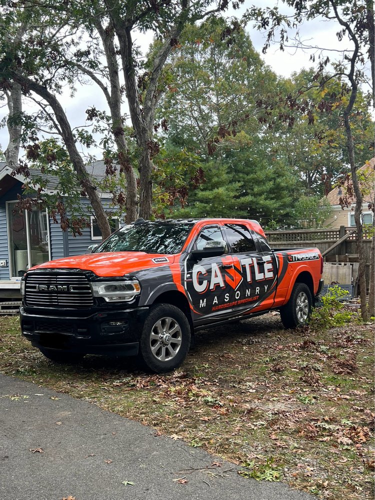 Castle Masonry truck parked at a job site on Cape Cod